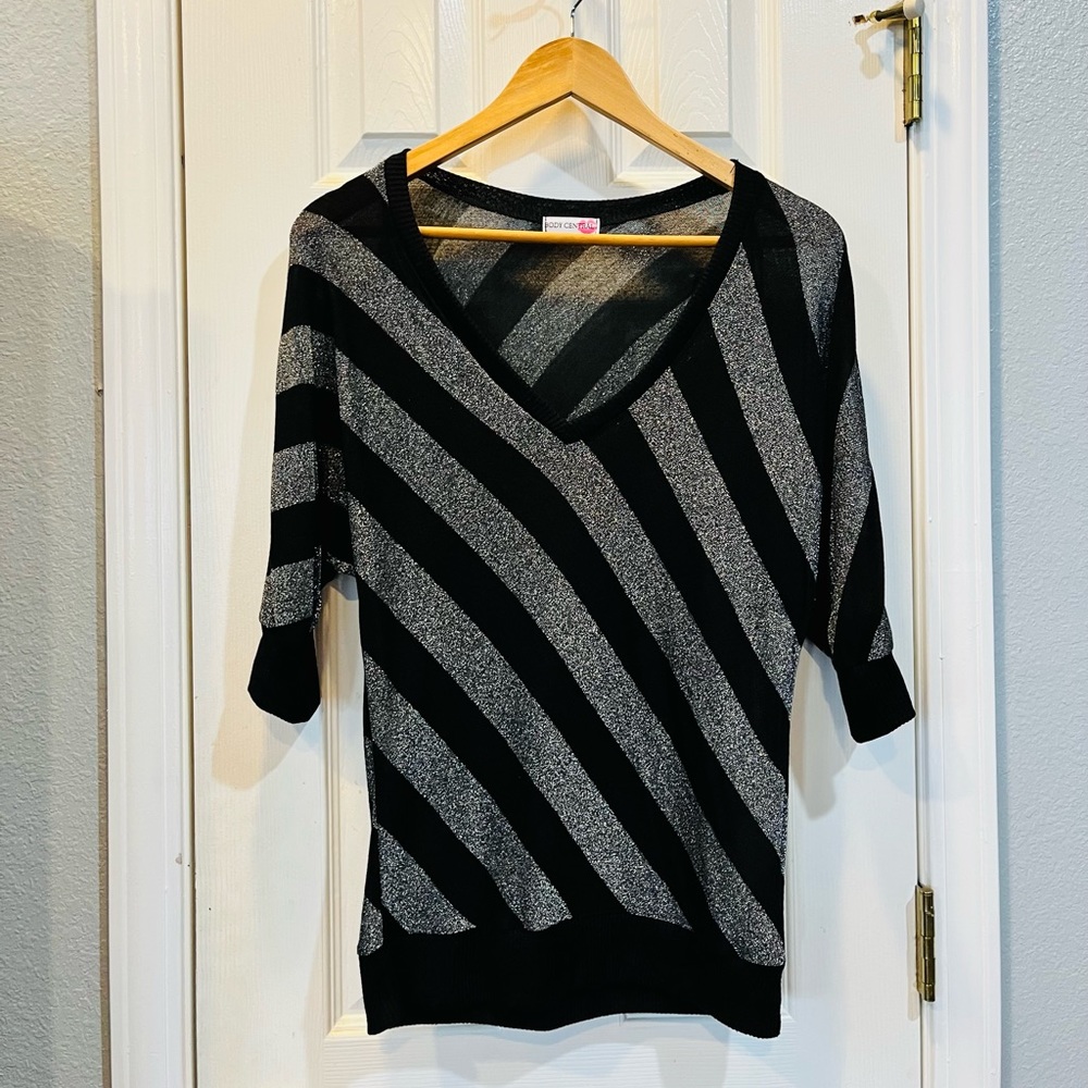Body Central v-beck black/silver shirt.  Sleeves are elbow length. Size M